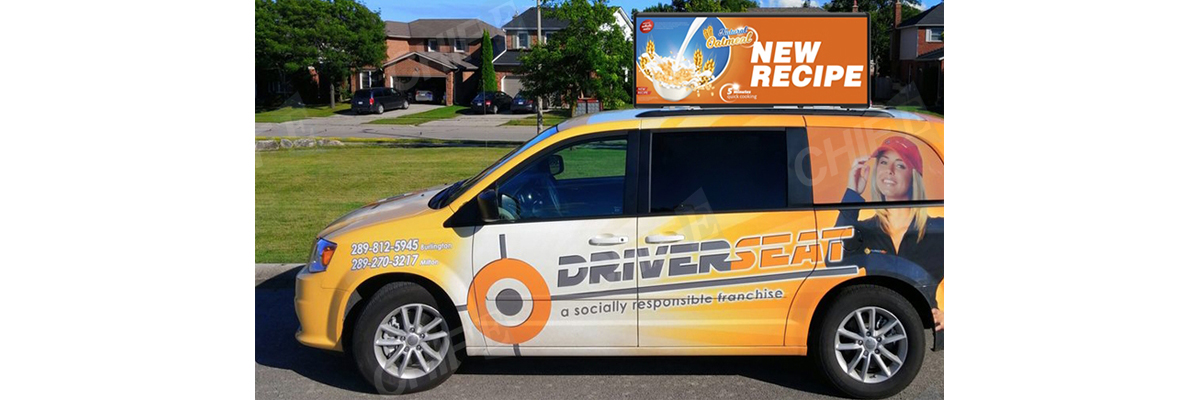 T-Shaped Sloped Taxi Roof LED Screen Installation Aerodynamic T-shaped sloped taxi roof LED screen mounted on a vehicle, showing universal compatibility for fleet advertising